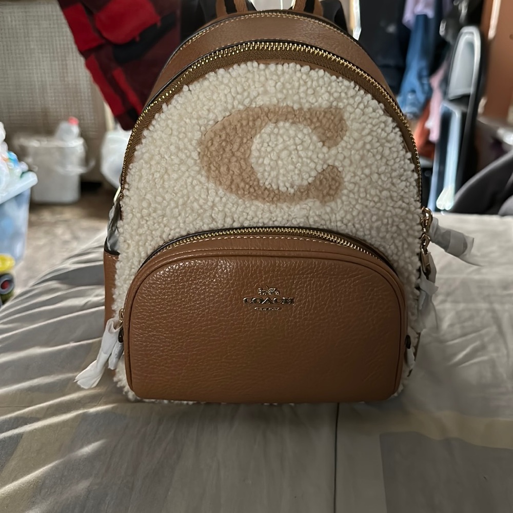 Brand new mini beige& tan coach backpack with a touch of shearling
